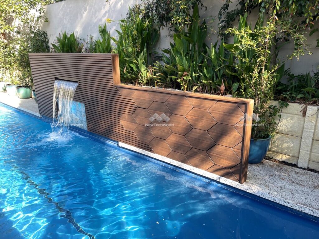 NewTechWood Pool Screen using US07 decking and UH61 cladding boards in Ipe
