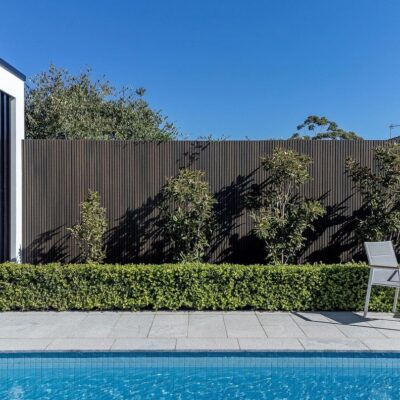 UH61 Castellation Cladding in Aged Wood on fence – by Allfence